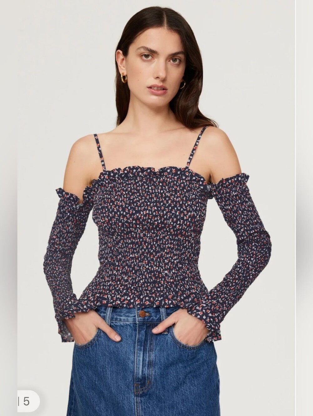 Floral Ruffled Smocked Cotton Top
Polo Ralph Lauren.